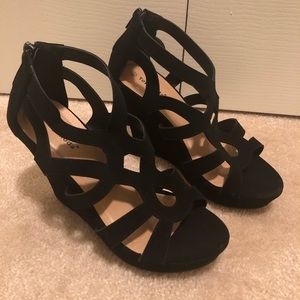Black strappy wedge sandals